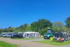 Winter electric hardstanding and grass touring pitches Winter electric hardstanding and grass touring pitches