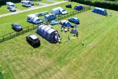 Aerial of the electric grass tent pitches Aerial of the electric grass tent pitches