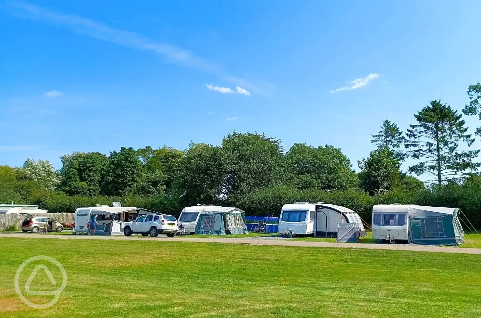 Electric hardstanding and grass touring pitches