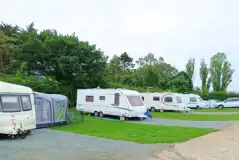 Winter electric hardstanding and grass touring pitches Winter electric hardstanding and grass touring pitches