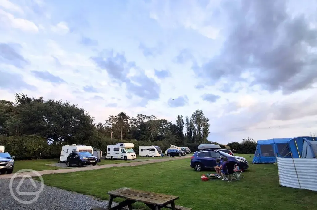 Electric hardstanding and grass touring pitches