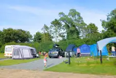 Winter electric hardstanding and grass touring pitches Winter electric hardstanding and grass touring pitches
