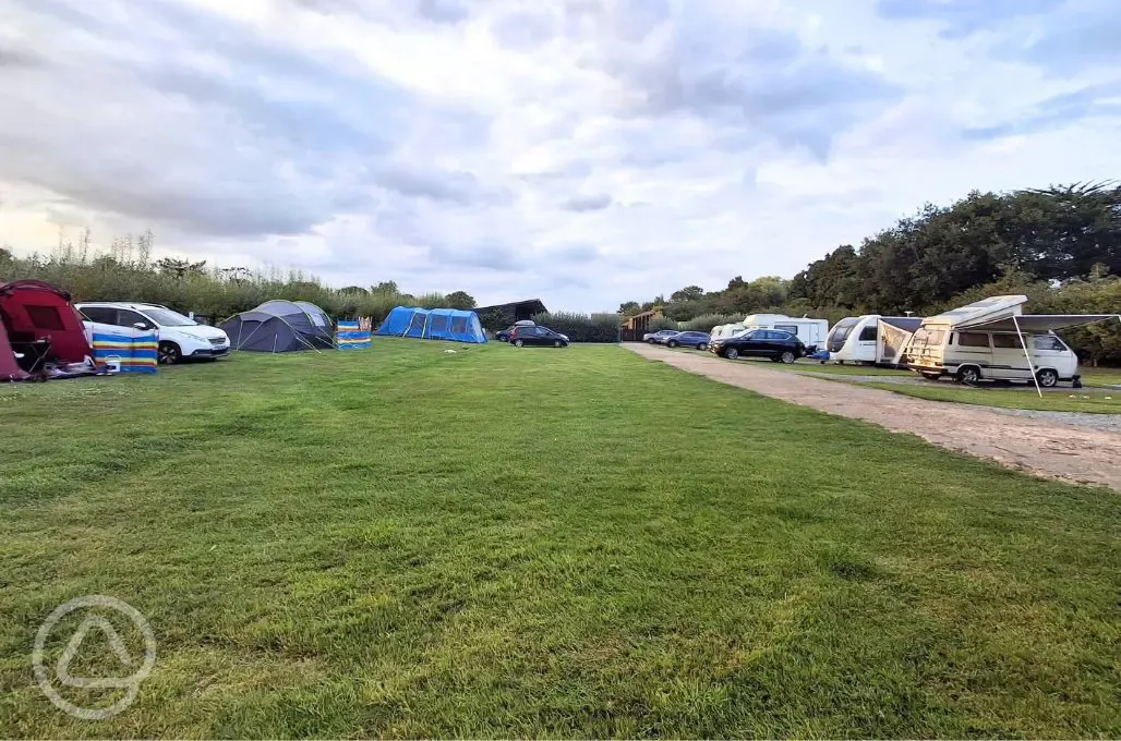 Electric hardstanding and grass touring pitches