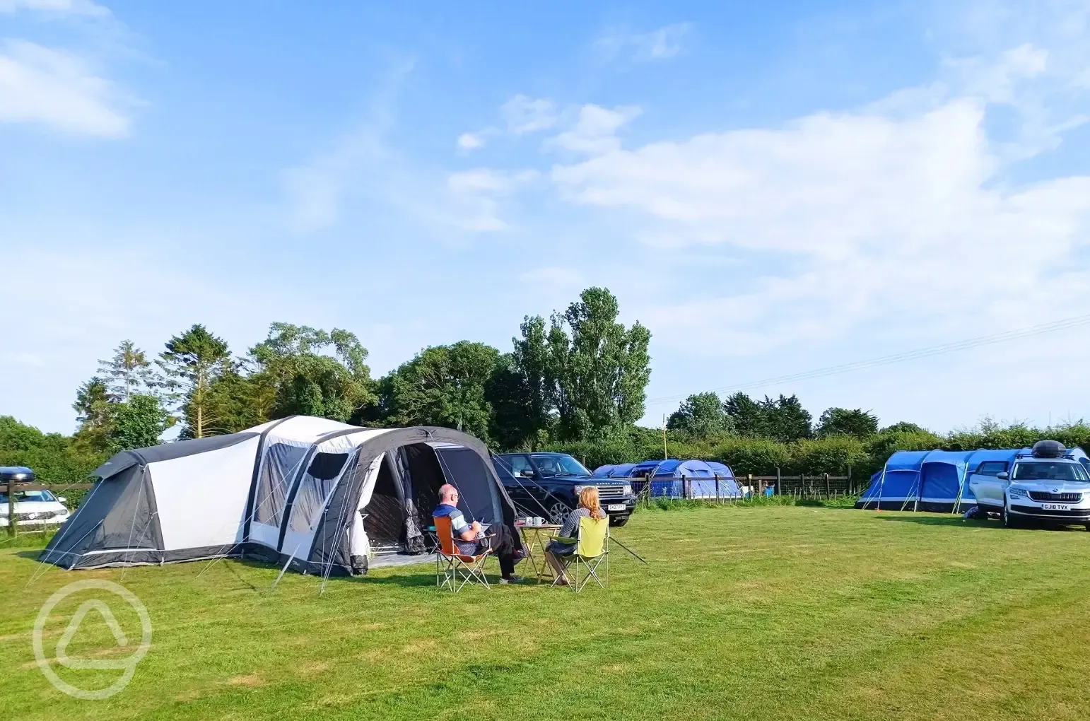 Electric grass tent pitches