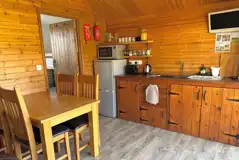 Log glamping cabin interior