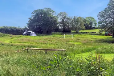 Pittaford Farm Camping within meadow grass
