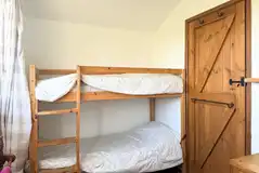 Log cabin bunk beds (bedding provided) Log cabin bunk beds (bedding provided)