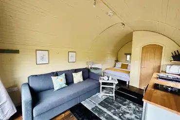 Glamping pod with hot tub interior