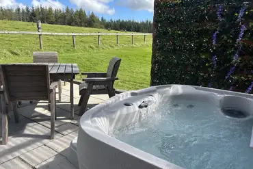 Glamping pods with an electric hot tub at Galloway Hills