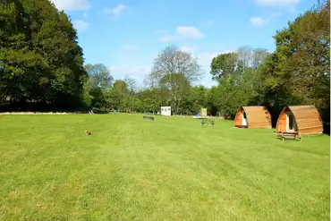 Grass pitches and camping pods