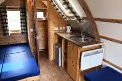 Camping pod interior with an ensuite loo (shared showers) Camping pod interior with an ensuite loo (shared showers)