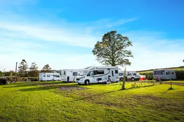 Hardstanding and grass pitches with optional 10 amp hook ups