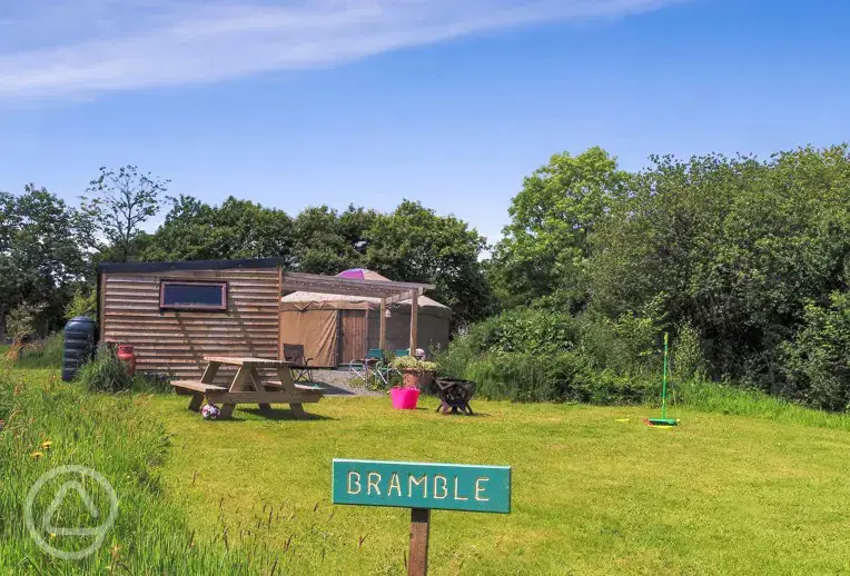Bramble yurt complete with an outdoor kitchen and picnic table