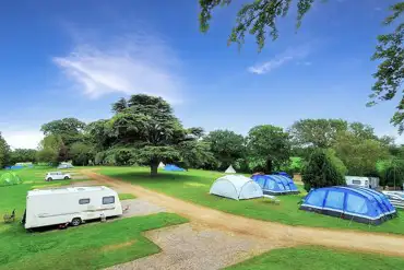 Aerial of the campsite with grass and hardstanding pitches