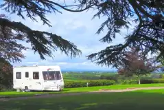Hardstanding with grass pitches for tourers