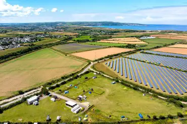 Aerial of The Old Stables towards the coast and neighbouring solar panels