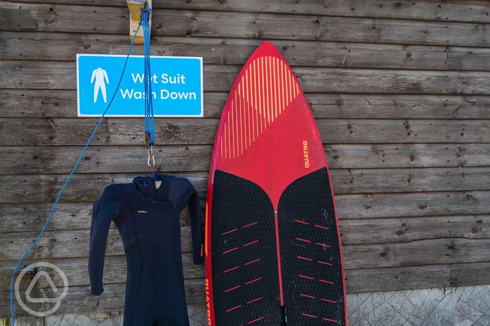 Outdoor wash for wetsuits and surf equipment