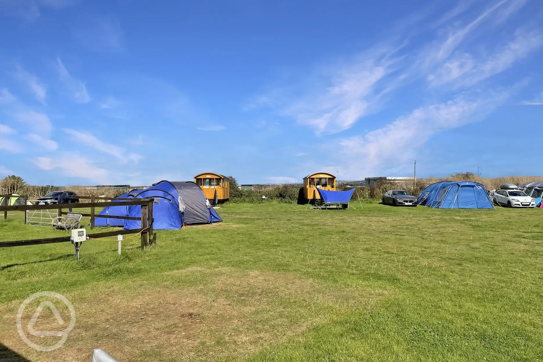 Shepherd's huts and grass pitches