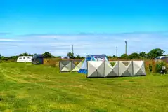 Electric grass pitches with windbreakers pitched Electric grass pitches with windbreakers pitched