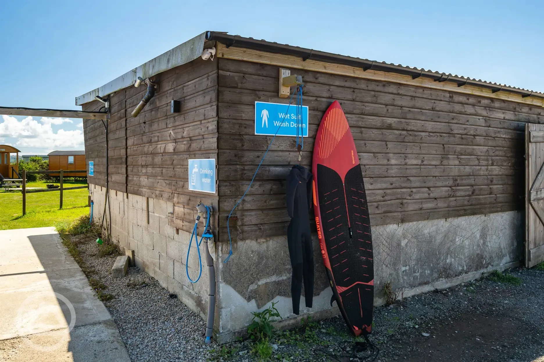 Outdoor wash for wetsuits and surf equipment