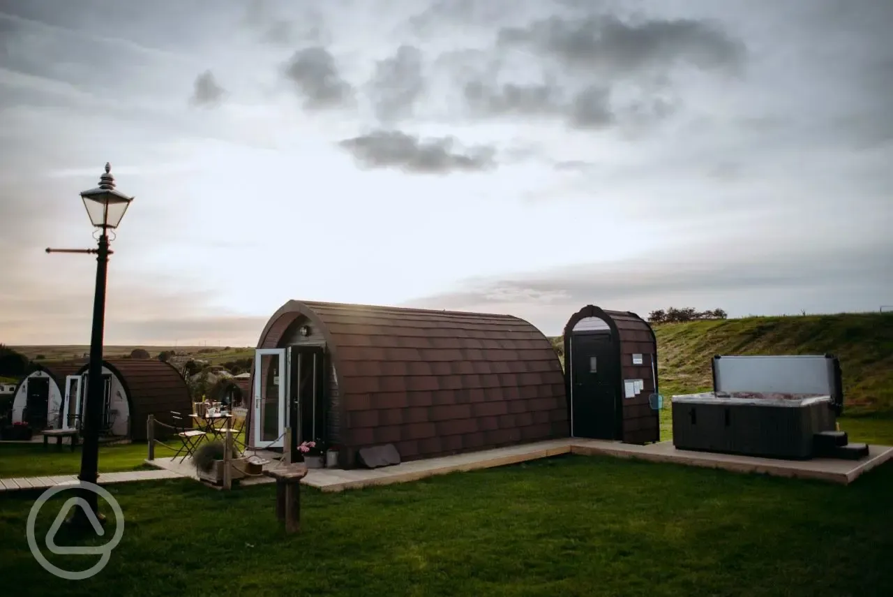 Family glamping pod with hot tub