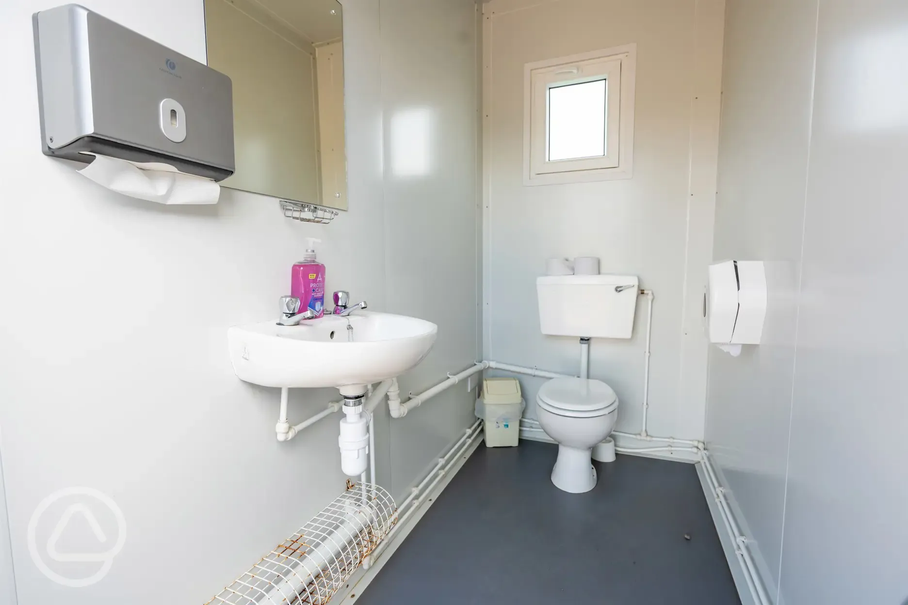 Toilets with sink and mirror