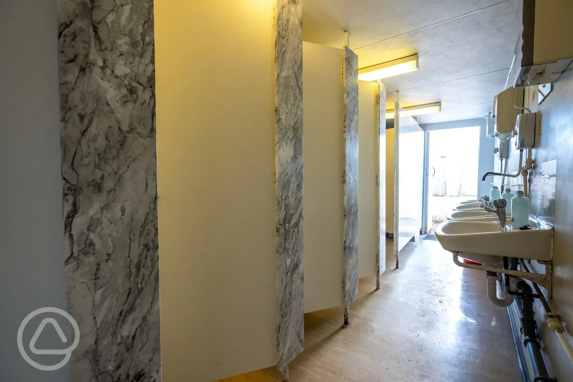 Toilet cubicles with sinks