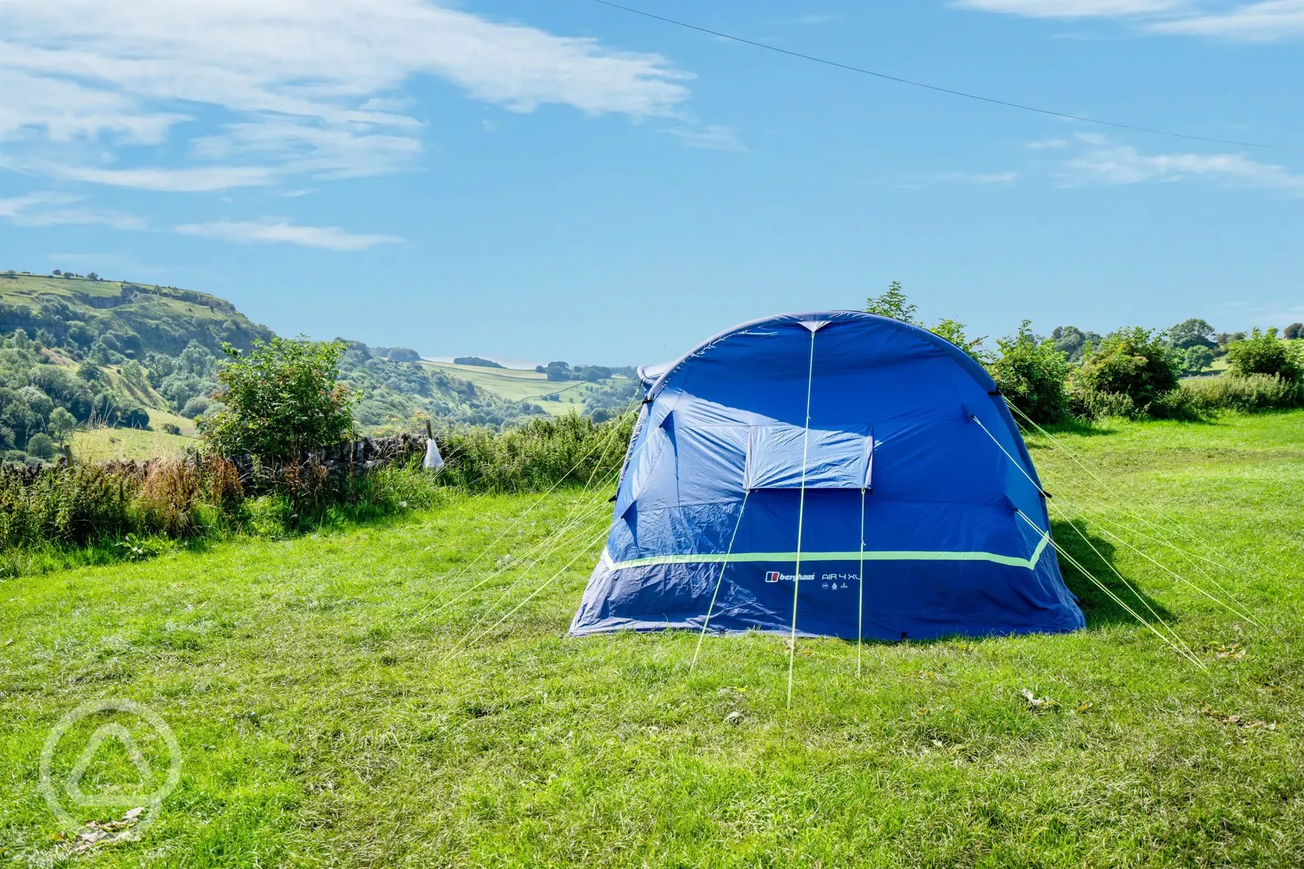 Non electric grass tent pitches with views of the country