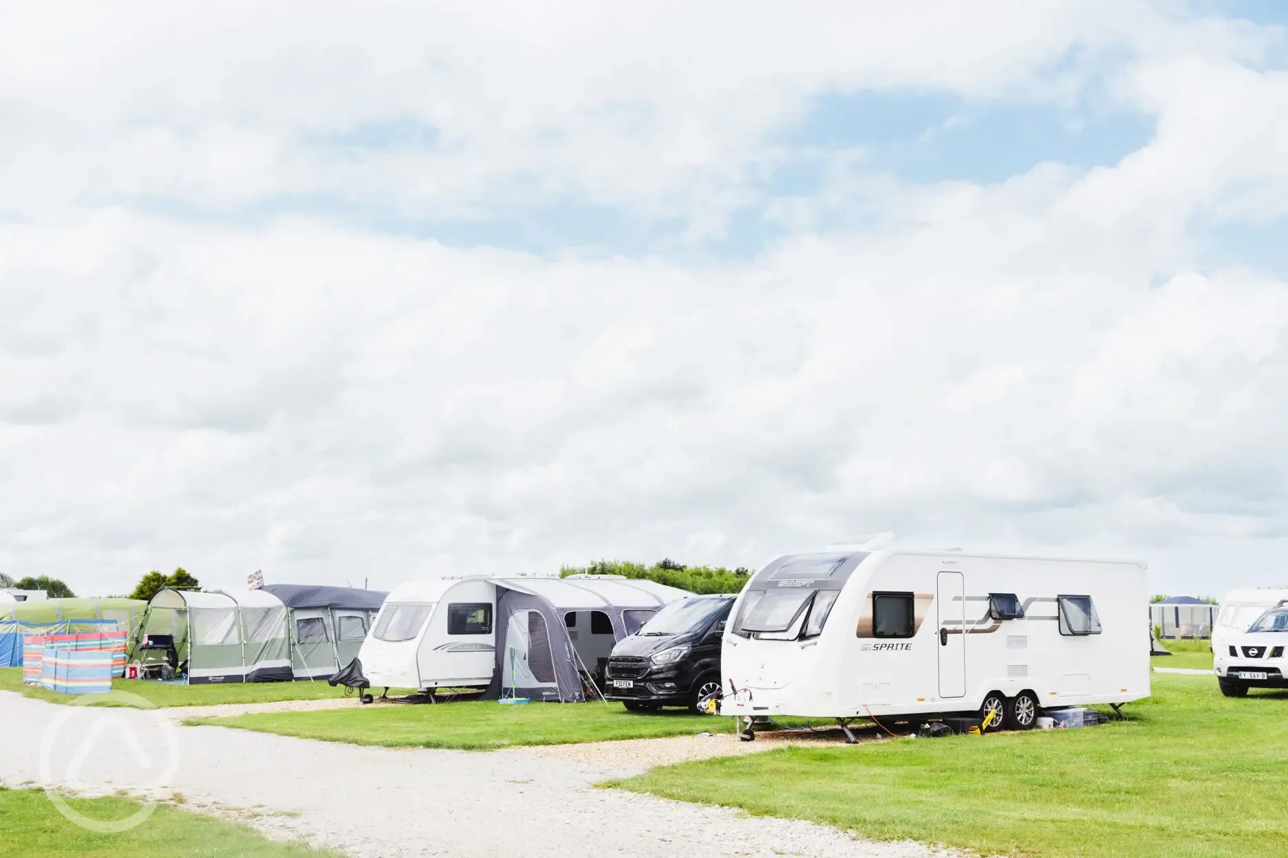 Fully serviced hardstanding touring pitches