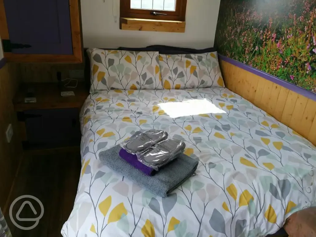Shepherd's hut bedroom with double bed