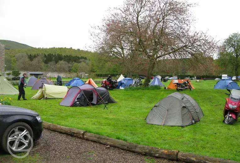 Large and small tents. Toilet and shower facilities.