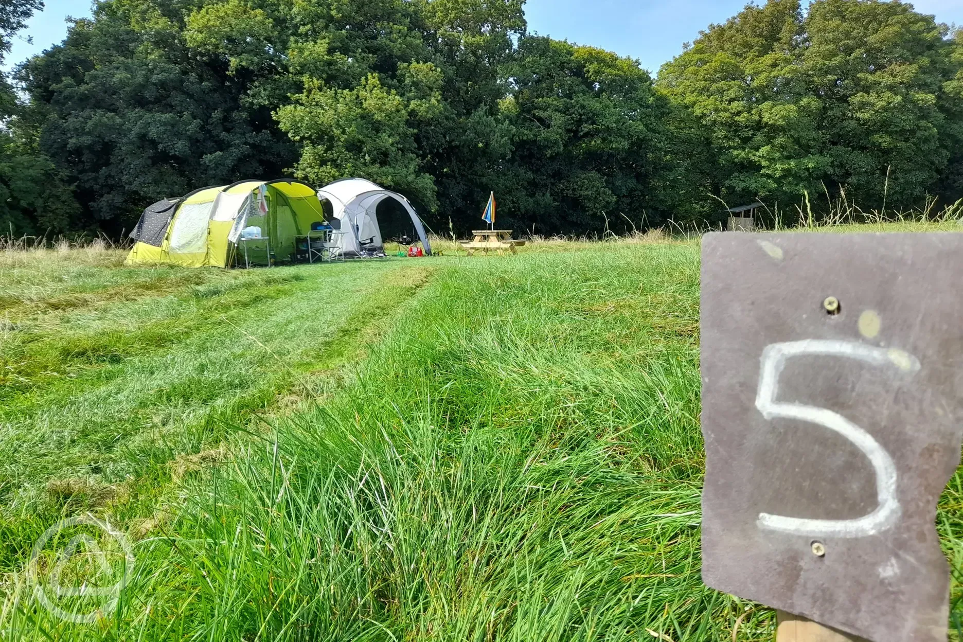 Non electric grass tent pitches