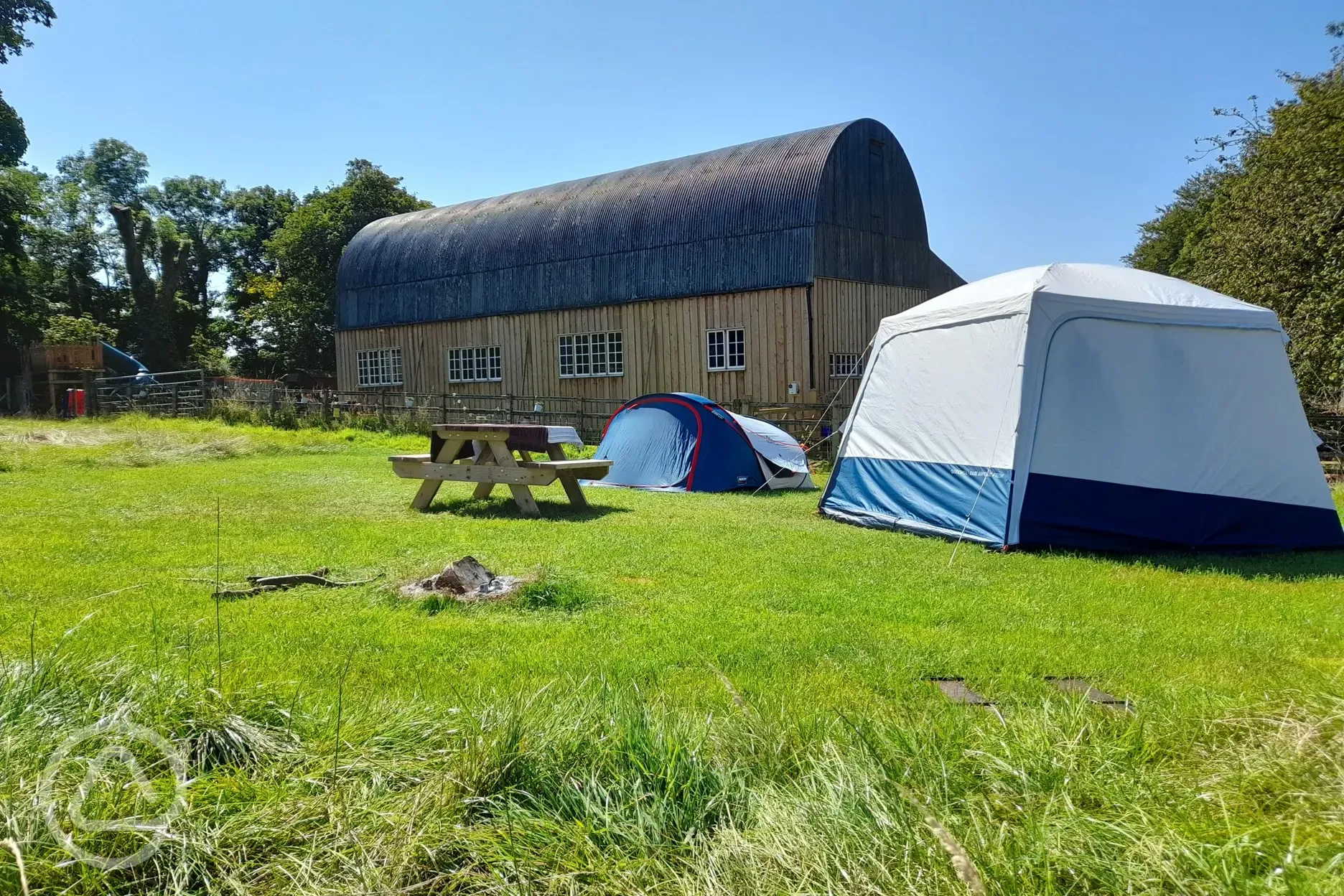 Non electric grass tent pitches