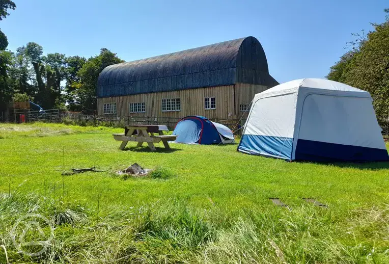 Non electric grass tent pitches