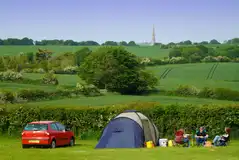 Non electric grass tent pitches