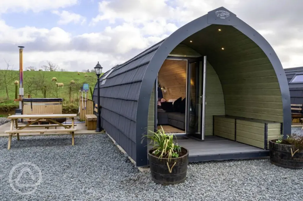 Glamping pod with hot tubs