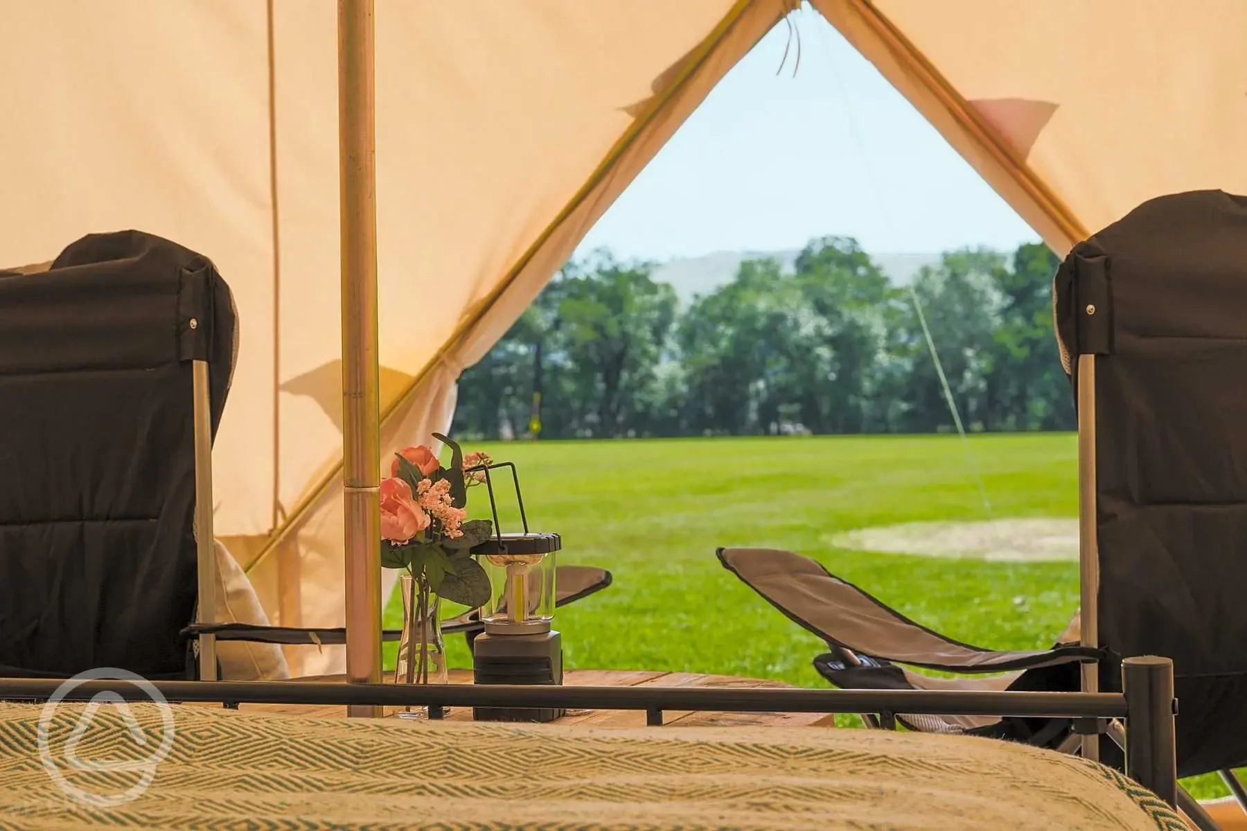 Bell tent interior with outside view