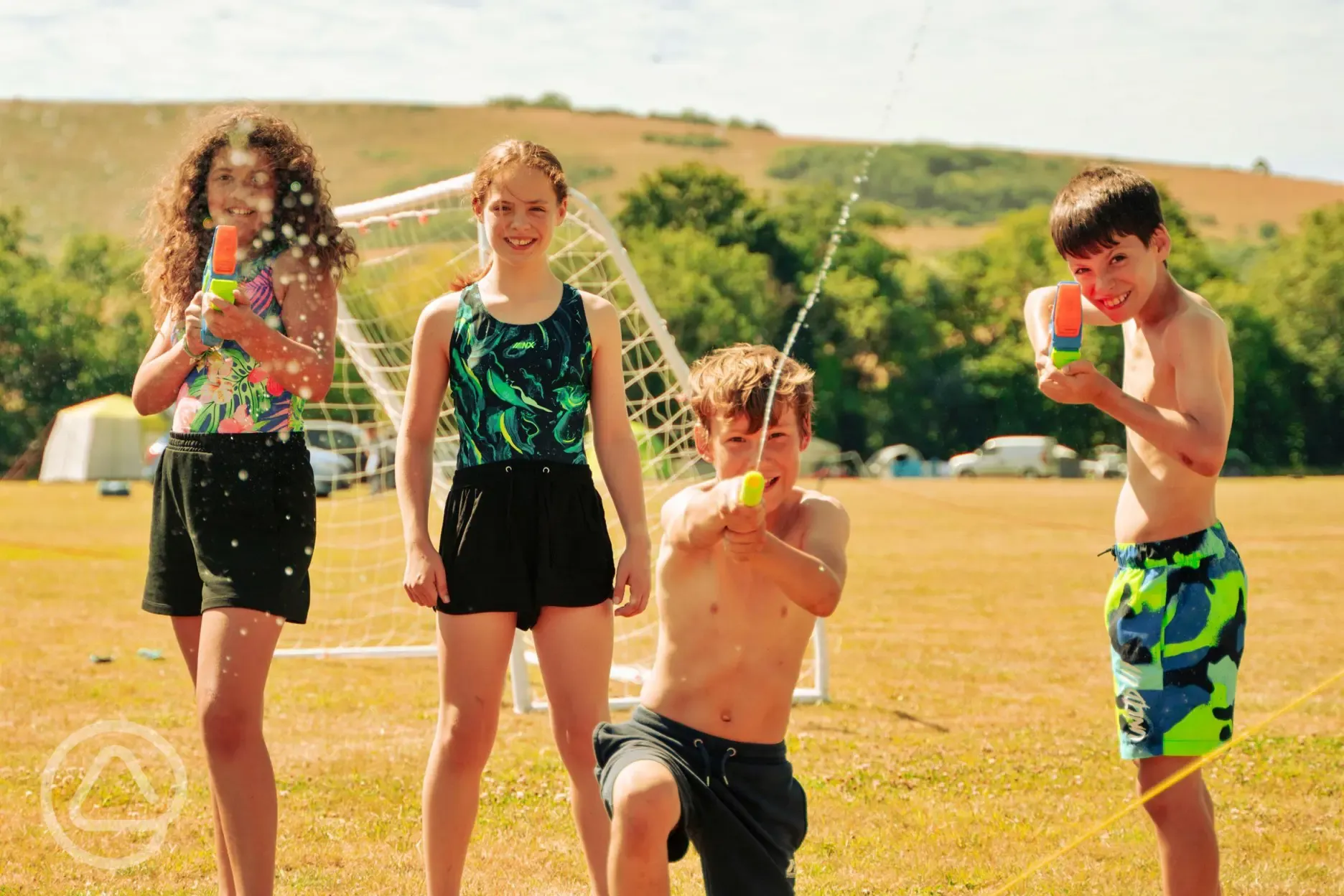 Family friendly water fight at Bramley Park Camping