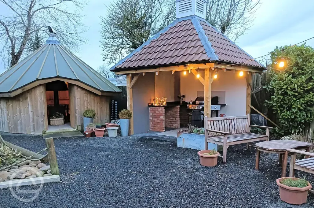 Communal fire pit and BBQ area