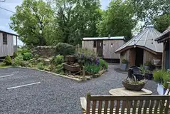 The Shepherd Hut by communal BBQ and fire pit