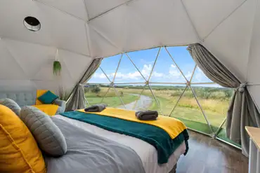 Taurus geodome interior with a king size bed