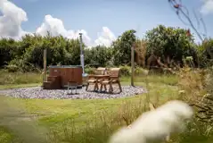 Taurus geodome wood-fired hot tub and seating area