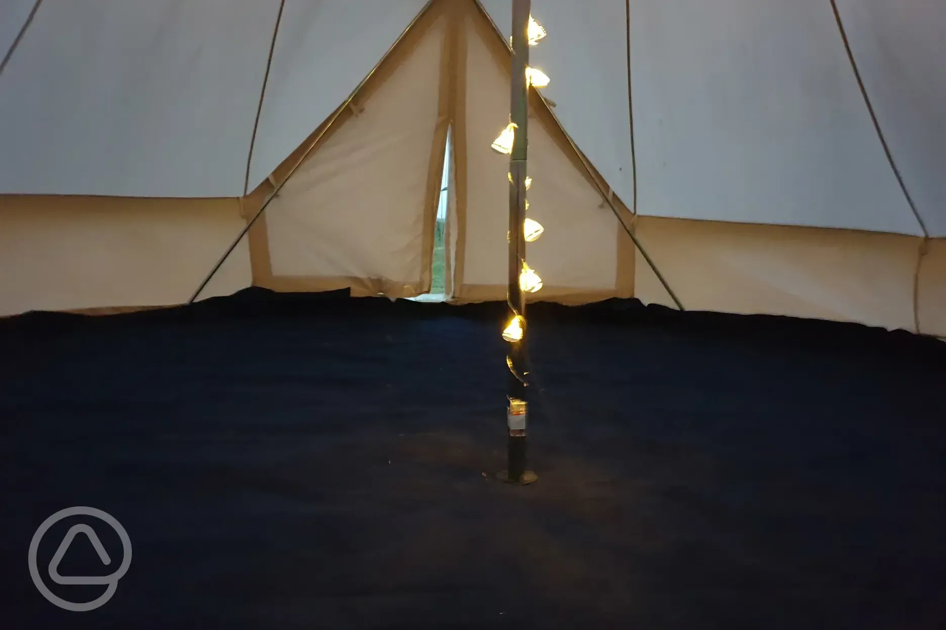 Inside an unfurnished bell tent