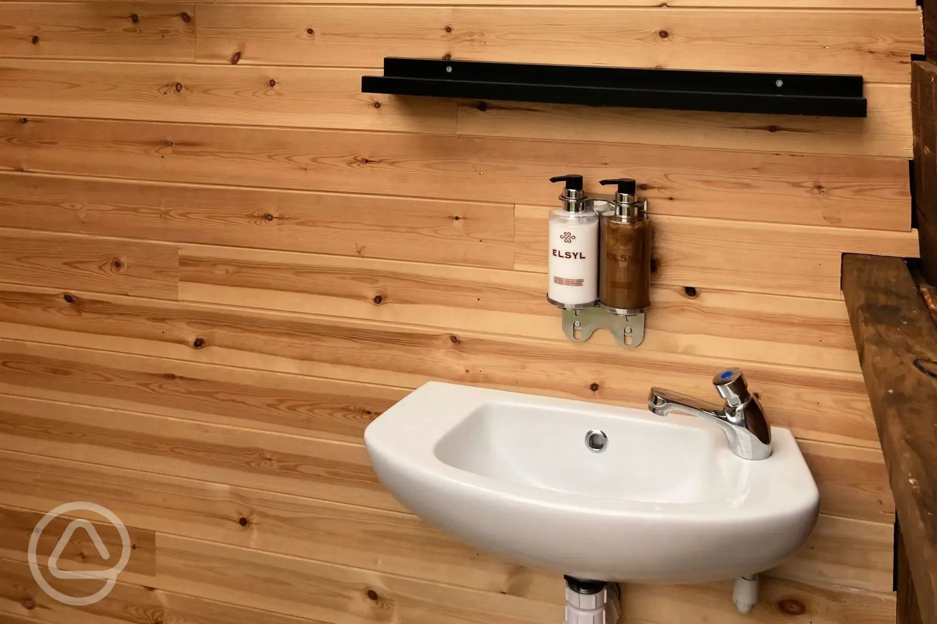 Sink in facility block with handwashing soap