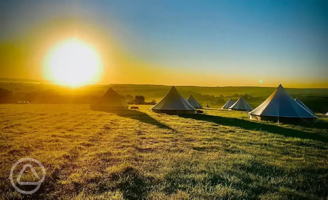 Bell tents with sunset