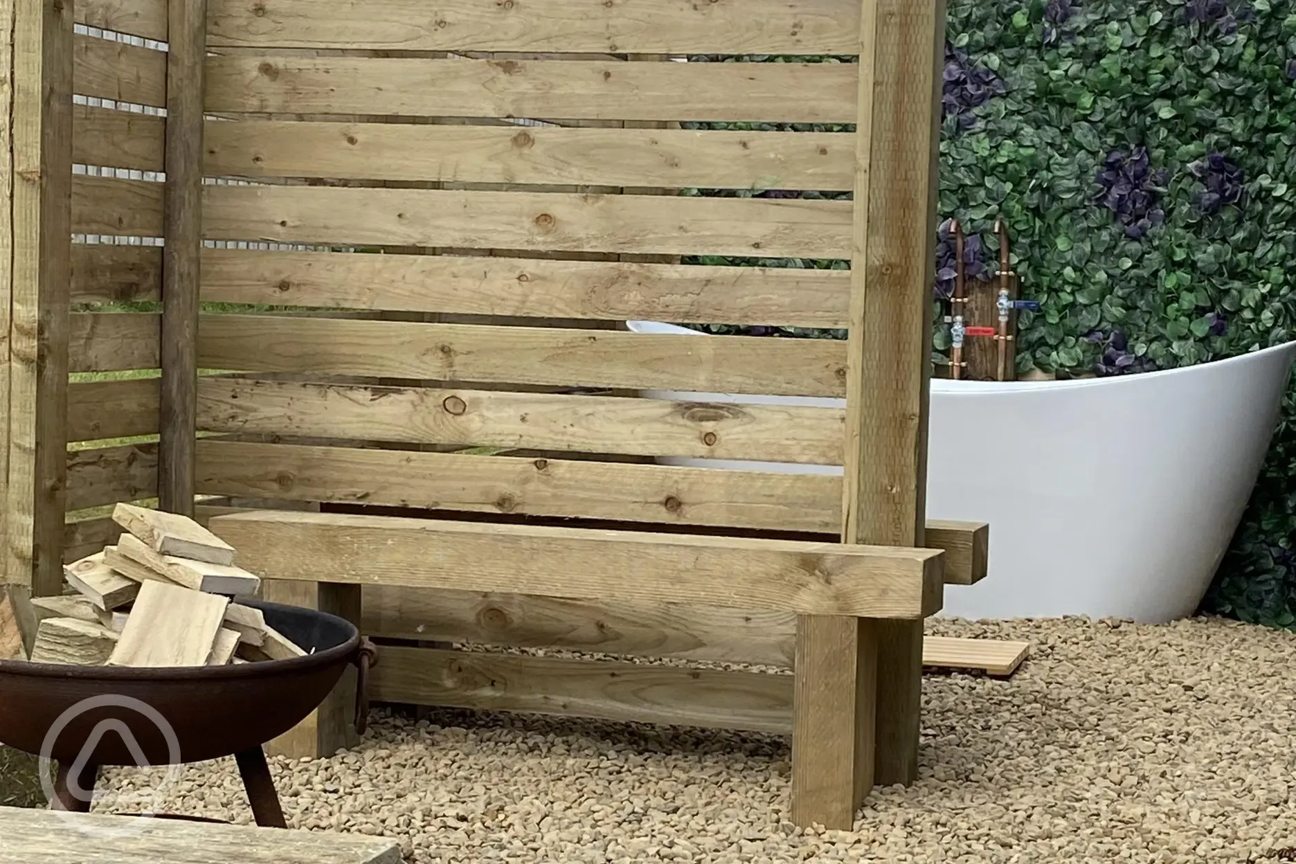 Cedar glamping pod fire pit and outdoor bath