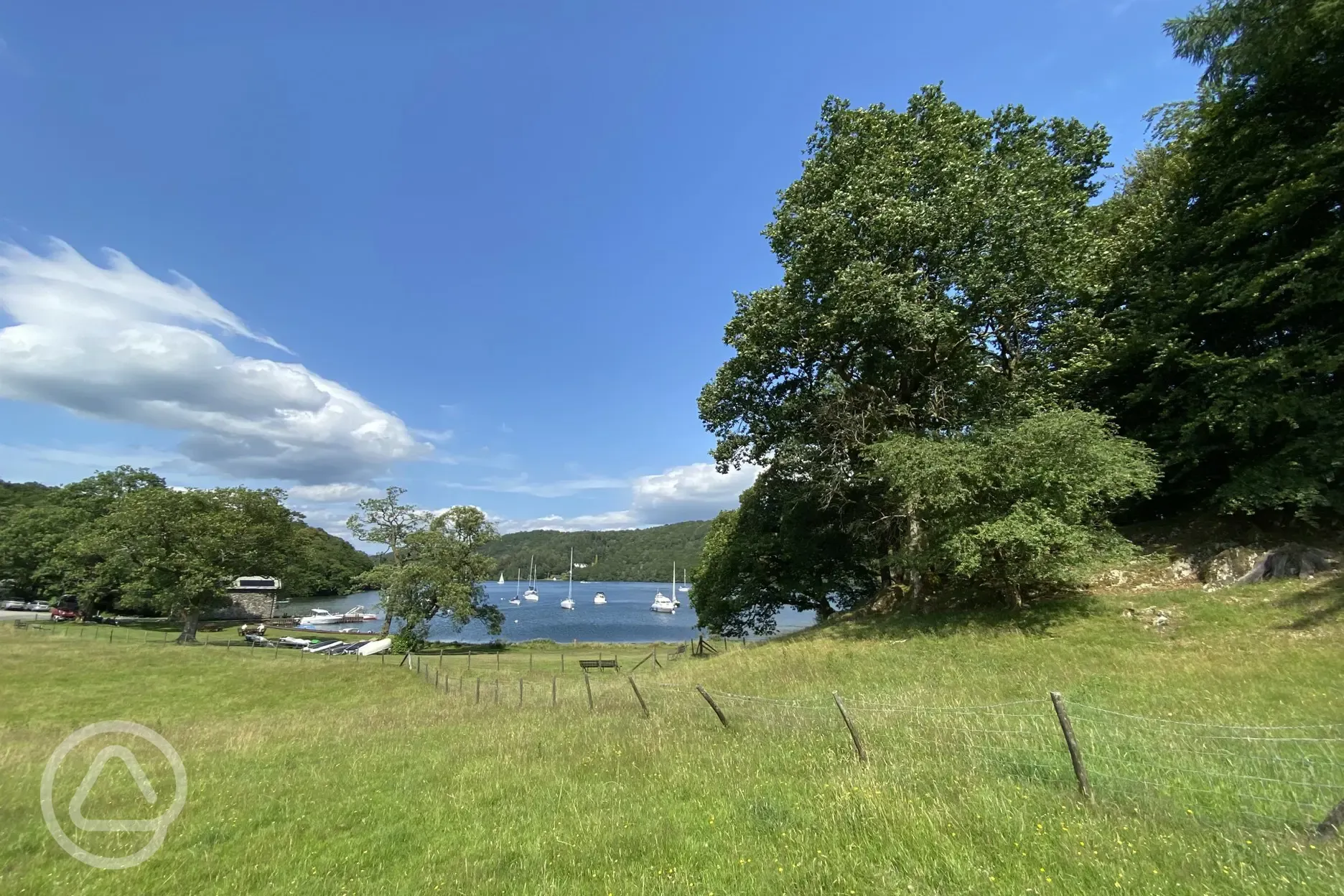 Non electric grass pitches and views of Lake Windemere