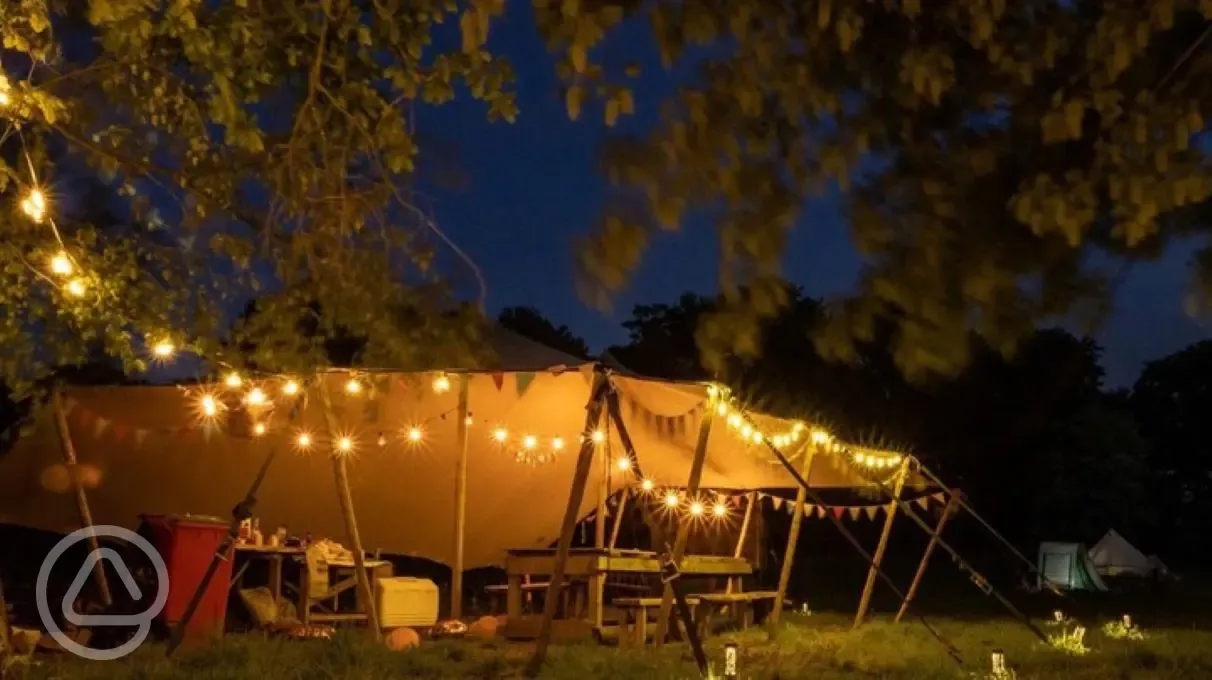 Communal tent at night