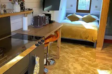 Kitchen and bed