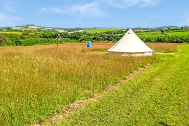 Bell tent with distant views of Dartmoor National Park at Cannamore Camping